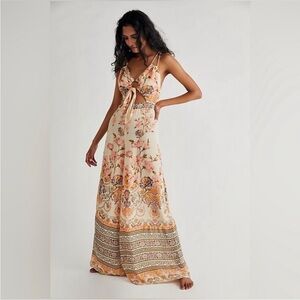 FREE PEOPLE SUNDOWN CUTOUT WIDE LEG FLORAL PRINT JUMPSUIT size 0